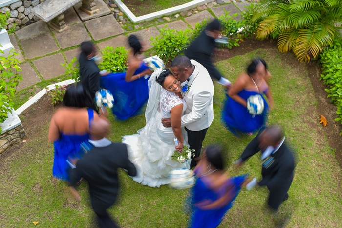 Jamaica wedding photography has flourished and there are many experienced photographers you can hire. Hire a wedding photographer who is experienced and is ready to listen to your ideas. Let your photographer know you personal choices so that he can capture shots that highlight your mood. Your wedding photographer needs to be friendly so that you can get comfortable with him. The best thing about Jamaican photographers is that they work in a very unobtrusive way. In most cases you would forget that there is someone with a camera who is capturing your every movement. This makes all the shots natural and also enables the photographer to capture vital moments that you may have forgotten. Wedding photography is all about authentic storytelling. A photographer tells the story of your love and hope and a new beginning through his lens. Let your wedding album capture all the moments that you have always dream of and help you to relive them whenever you feel like going back. Your Jamaican wedding photographer would make your life’s most important event immortal through his camera. As you flip the pages of the album you would experience the same gush of love, romance and hope that you felt on your wedding day. That’s what makes wedding photography so special